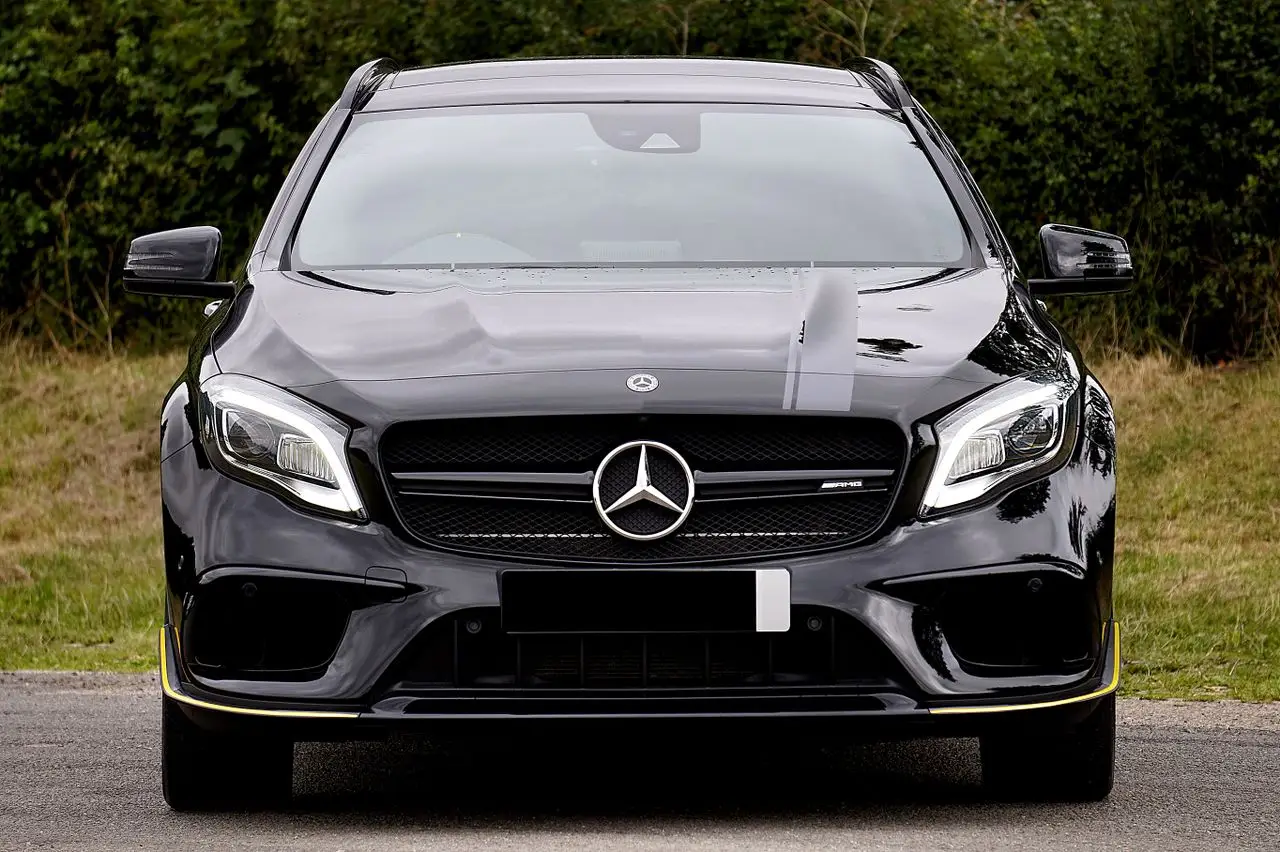 services-03 Luxurious black Mercedes-Benz AMG parked outdoors, showcasing elegance and style.